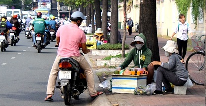 Bí mật cam vắt giá 7.000 đồng ở vỉa hè Sài Gòn