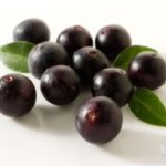 Acai Berries anti oxident fruit loose on a white background read